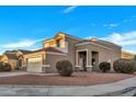 Two-story house with a two-car garage and desert landscaping at 3702 W Naomi Ln, San Tan Valley, AZ 85144