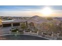 Stunning aerial view of a custom home with a circular driveway at 4208 N Via Cobre Cir, Mesa, AZ 85207