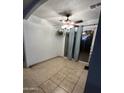 Dining area with tile floors and sliding doors at 4417 N 70Th Ave, Phoenix, AZ 85033