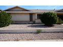 Neatly landscaped front yard with gravel at 17407 N Country Club N Dr, Sun City, AZ 85373