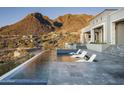 Infinity pool with mountain views at 21312 N 113Th Pl, Scottsdale, AZ 85255