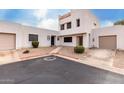 Two-story stucco home with attached garage and landscaped front yard at 2535 W Canyon Crest Cir, Phoenix, AZ 85023