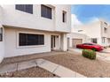 Two-story stucco home with attached garage and landscaped front yard at 2535 W Canyon Crest Cir, Phoenix, AZ 85023