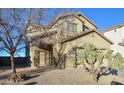 Two-story house with desert landscaping and a two-car garage at 35706 W Costa Blanca Dr, Maricopa, AZ 85138