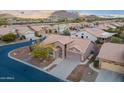 Aerial view showcasing the home's location within a residential community at 6043 S Fairway Dr, Gold Canyon, AZ 85118