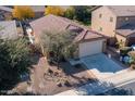 One-story house, landscaped yard, and driveway at 741 W Harvest Rd, San Tan Valley, AZ 85140