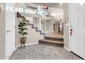 Bright entryway with stairs leading to the second floor at 906 N Swan Dr, Gilbert, AZ 85234