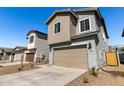 Two-story home with a two-car garage and low-maintenance landscaping at 9350 E Sequence Ave, Mesa, AZ 85212