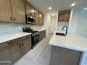 Clean lines and modern cabinetry define this stylish kitchen at 9350 E Sequence Ave, Mesa, AZ 85212