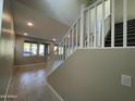 Modern staircase with white railings leading to the second floor at 9358 E Sequence Ave, Mesa, AZ 85212