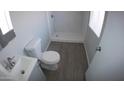 Modern bathroom with gray flooring and a walk-in shower at 422 W Jamestown Rd, Kearny, AZ 85137