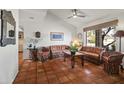 Bright living room featuring tile floors, large window and comfortable seating at 4301 E Montecito Ave, Phoenix, AZ 85018