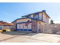 Two-story house with a large garage and gated entrance at 6921 W Columbine Dr, Peoria, AZ 85381