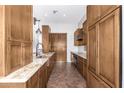 Spacious kitchen with granite countertops and wood cabinets at 1875 E Stephens Dr, Tempe, AZ 85283