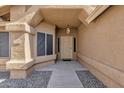 Front entry with security door and sidelights at 23827 N 44Th Ln, Glendale, AZ 85310