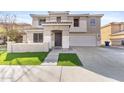 Two-story house with attached garage and attractive landscaping at 2942 S Sierra Hts, Mesa, AZ 85212