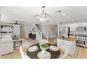 Open concept kitchen and dining area with modern appliances and island at 2942 S Sierra Hts, Mesa, AZ 85212