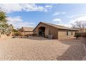 Large backyard with gravel and space for entertaining at 29590 N Balmoral Pl, San Tan Valley, AZ 85143