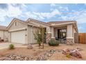 Charming curb appeal with stone accents and a well-maintained yard at 30130 N Jillian Dr, San Tan Valley, AZ 85143