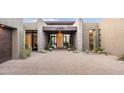 Front entrance with brick facade and desert landscaping at 38484 N 94Th St, Scottsdale, AZ 85262