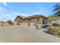 Attached two-car garage with extra-long driveway at 3936 E Ascot Dr, San Tan Valley, AZ 85140