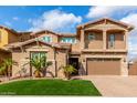 Two-story house with a large garage and landscaped front yard at 4176 E Glacier Pl, Chandler, AZ 85249