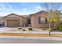 Inviting single-story home with well-maintained landscaping and a cozy front yard at 5724 S Coyote Cyn, Mesa, AZ 85212