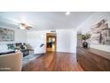 Living room features hardwood floors and an open floor plan at 8514 E Fairmount Ave, Scottsdale, AZ 85251