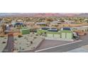 Modern home with solar panels, spacious yard, and mountain backdrop at 10 E Old Paint Trl, Phoenix, AZ 85086