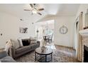 Spacious living room featuring hardwood floors and a cozy seating area at 15050 N Thompson Peak Pkwy # 2033, Scottsdale, AZ 85260