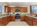 Well-equipped kitchen, featuring stainless steel appliances at 2150 W Alameda Rd # 1313, Phoenix, AZ 85085