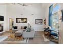 Bright living room featuring a sectional sofa and wood floors at 2201 N Comanche Dr # 1075, Chandler, AZ 85224