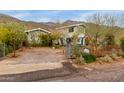 Charming house with mountain views and a fenced yard at 250 N Neary Ave, Superior, AZ 85173