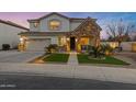 Two-story house with stone accents and landscaped front yard at 4103 E Mead Way, Chandler, AZ 85249