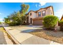 Two-story house with a front yard and a sidewalk at 41405 W Cielo Ln, Maricopa, AZ 85138