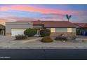 Single-story home with a terracotta tile roof and landscaped front yard at 500 E Encinas Ave, Gilbert, AZ 85234