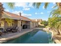 Inviting backyard with a sparkling pool and patio seating at 500 E Encinas Ave, Gilbert, AZ 85234