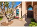 Ornate front door entrance with a welcoming seating area at 10921 W Bermuda Dr, Avondale, AZ 85392