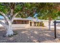 Charming single-story home with desert landscaping and a convenient two-car garage at 11008 W Cherry Hills W Dr, Sun City, AZ 85351