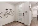 Bright and airy entryway with modern door and wall decor at 11673 N 136Th St # 1021, Scottsdale, AZ 85259