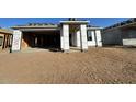 Under construction home with a two-car garage at 22844 E Lords Way, Queen Creek, AZ 85142