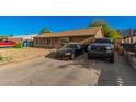 House exterior featuring a front yard and parking at 2817 W Marshall Ave, Phoenix, AZ 85017