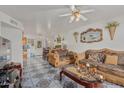 Open living space with tiled floors and kitchen views at 2817 W Marshall Ave, Phoenix, AZ 85017