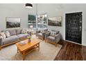 Living room with hardwood floors and comfy seating at 3835 E Kent Dr, Phoenix, AZ 85044