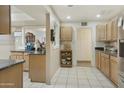 Open kitchen with granite countertops and ample cabinet space at 4305 E Earll Dr, Phoenix, AZ 85018