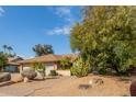 House exterior showcasing a walkway and desert landscaping at 4532 E Sandra Ter, Phoenix, AZ 85032