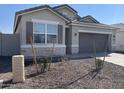 New construction home with a two-car garage at 4929 S 105Th Ln, Tolleson, AZ 85353