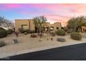 Stunning desert home with attractive landscaping at 10874 E Dale Ln, Scottsdale, AZ 85262