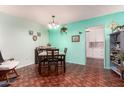 Bright dining room with a table and chairs, offering an open layout at 13234 N 109Th Ave, Sun City, AZ 85351