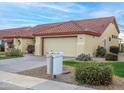 Front view of a house with a two-car garage and mailbox at 14131 W Circle Ridge Dr, Sun City West, AZ 85375